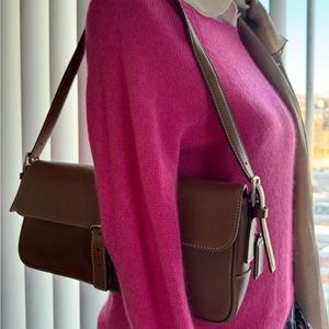 Authentic vintage tan coach purse with coach tag.